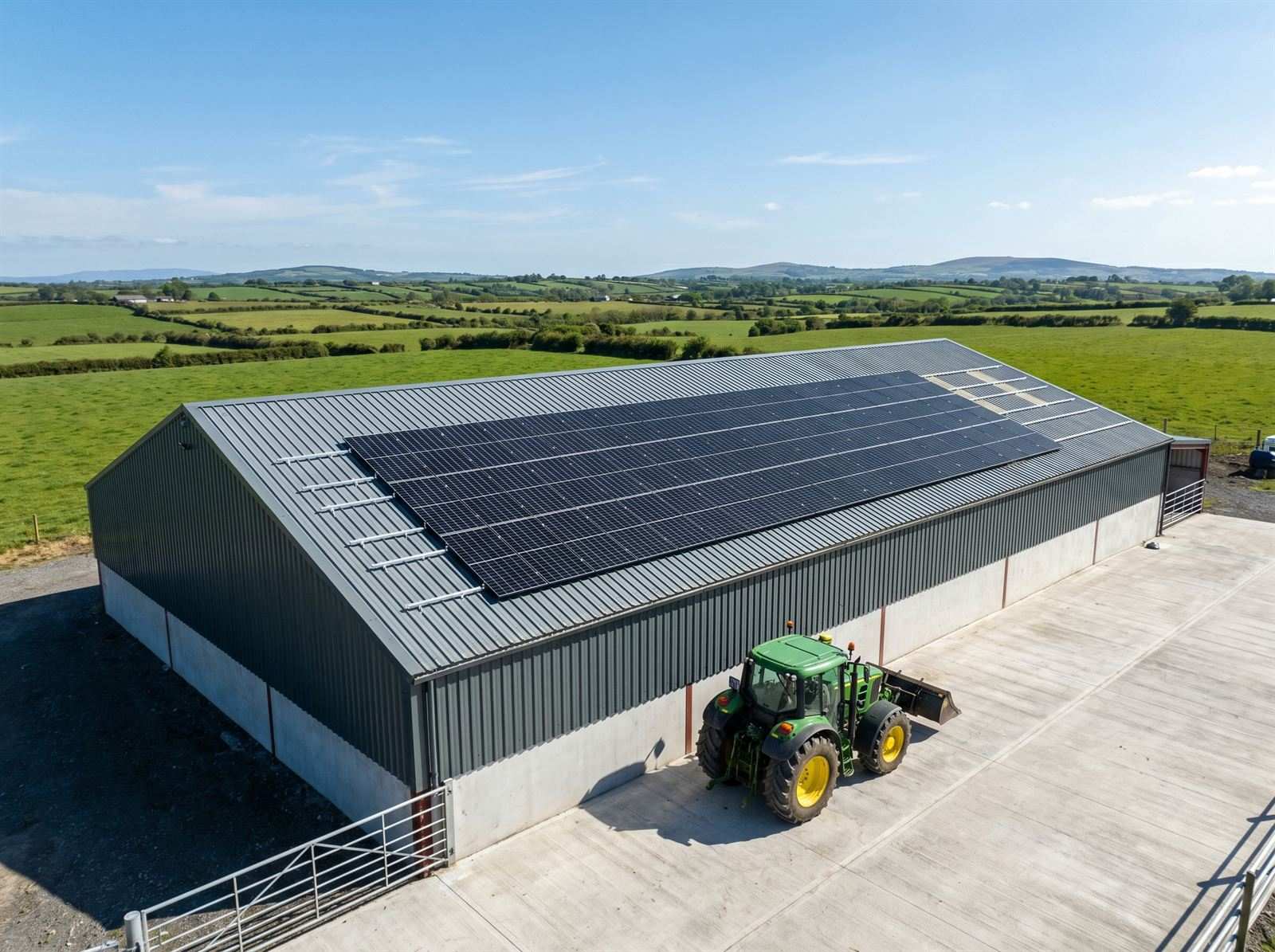 Aerial view of solar panels on an Irish farm shed roof