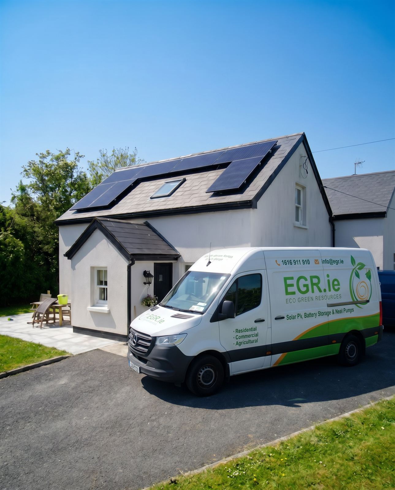 White EGR.ie van outside an Irish home with rooftop solar panels installed by EGR